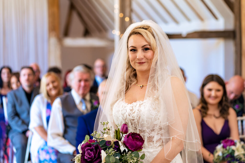 Bride beaming at guests at Skylark Golf and Country Club, Whiteley