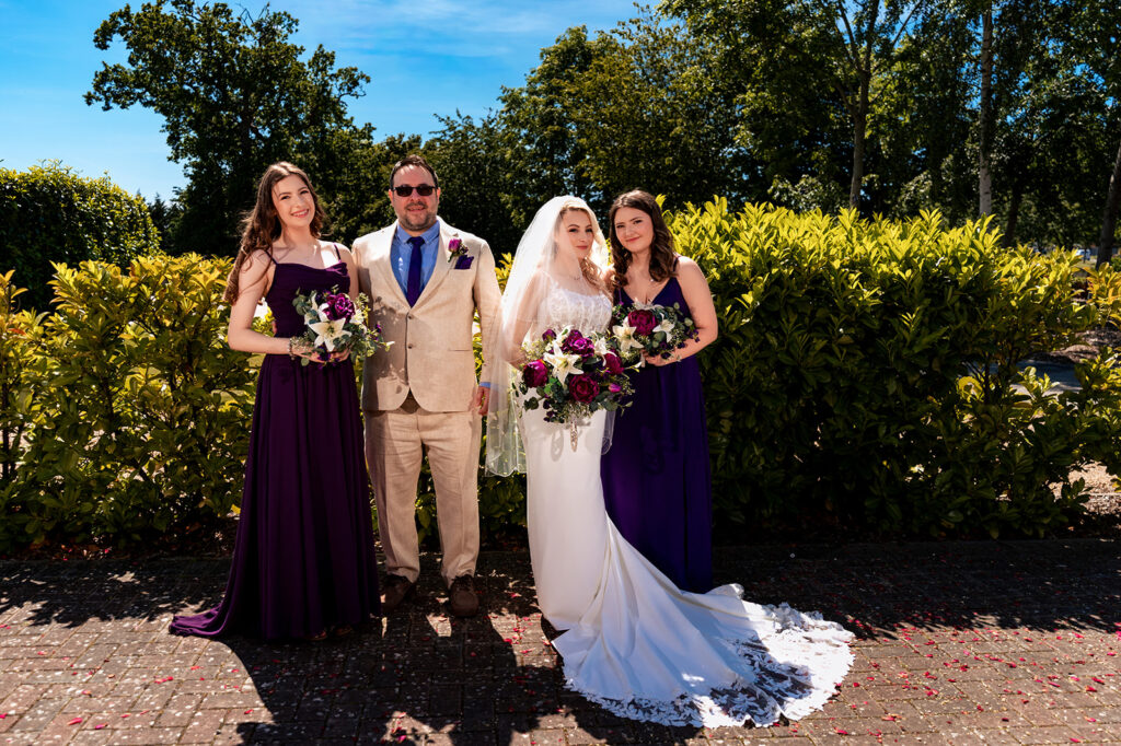 Newlyweds in the summer gardens at Skylark Golf and Country Club, Whiteley