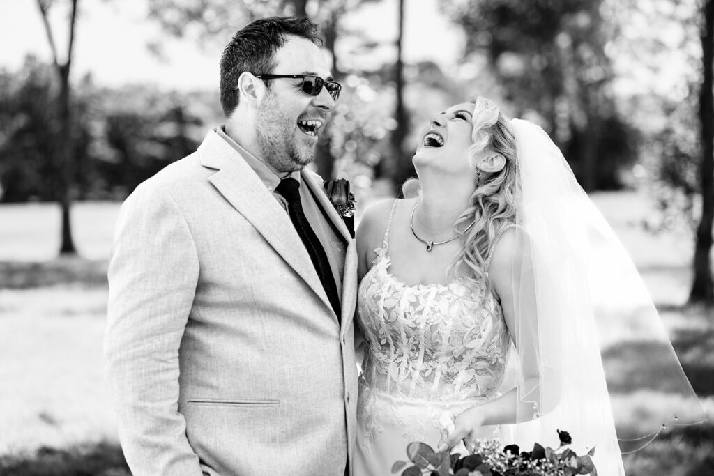 Couple laughing, black and white at Skylark Golf and Country Club, Whiteley
