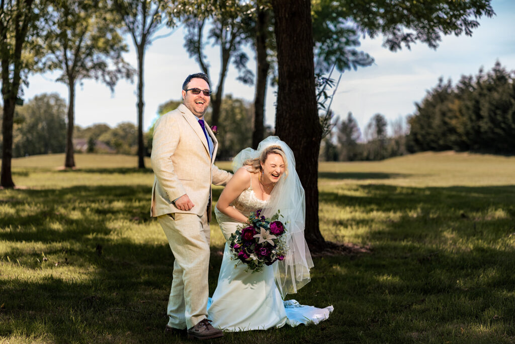Groom lifting the bride on the golf course at Skylark Golf and Country Club, Whiteley