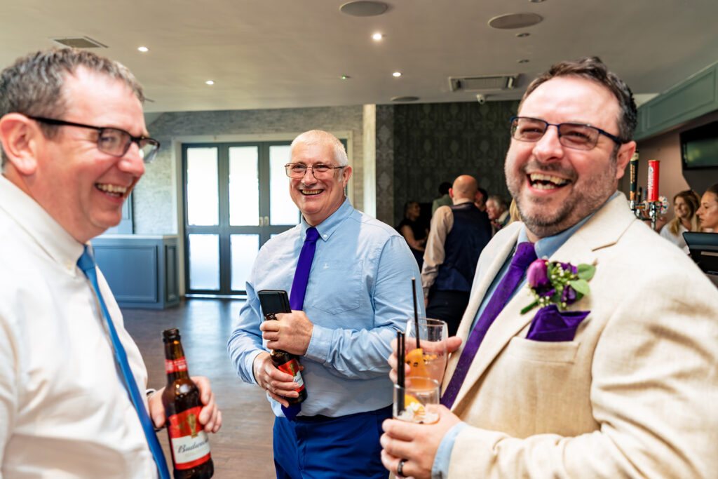 Groom laughing with guests at Skylark Golf and Country Club, Whiteley