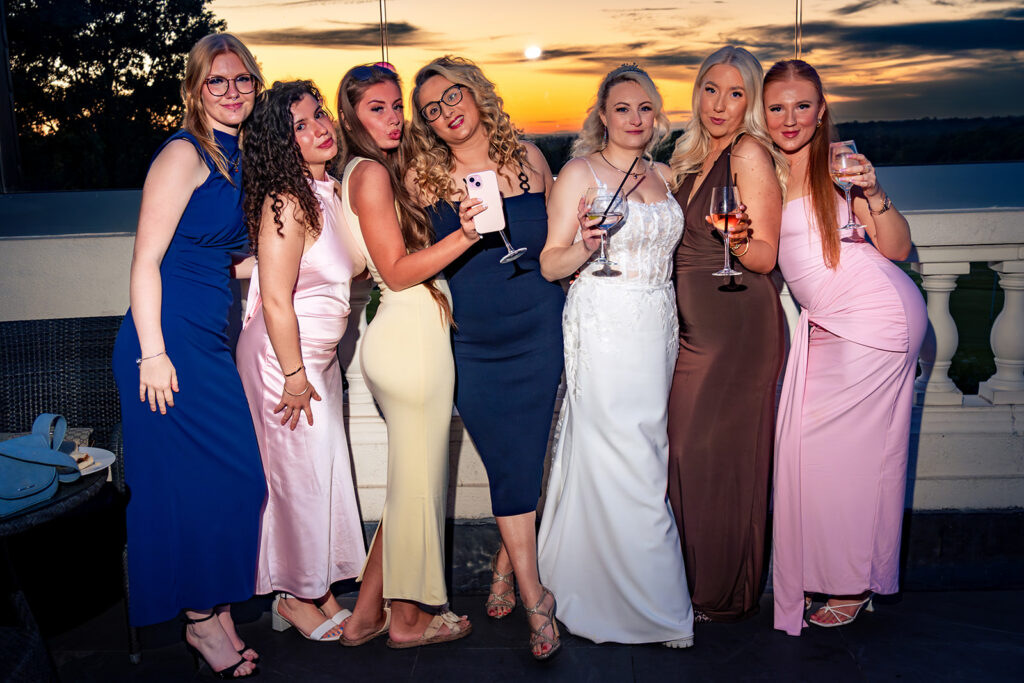 Bridesmaids posing on the dancefloor at Skylark Golf and Country Club, Whiteley