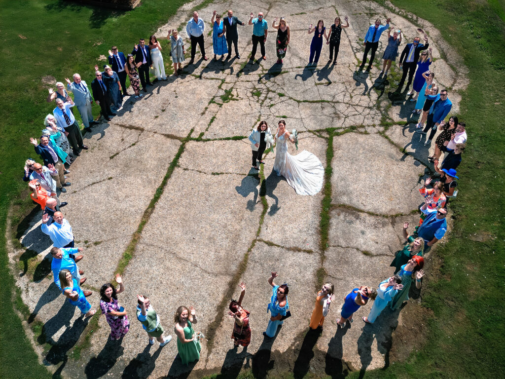Drone shot of guests in a circle at Southlands Barn, West Sussex