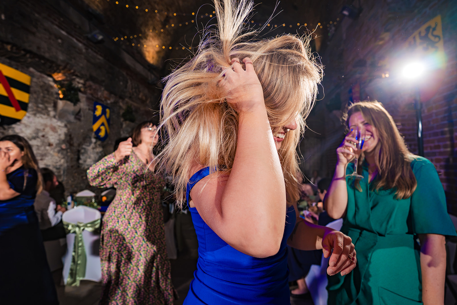 Guest flipping her hair on the dancefloor at The Square Tower