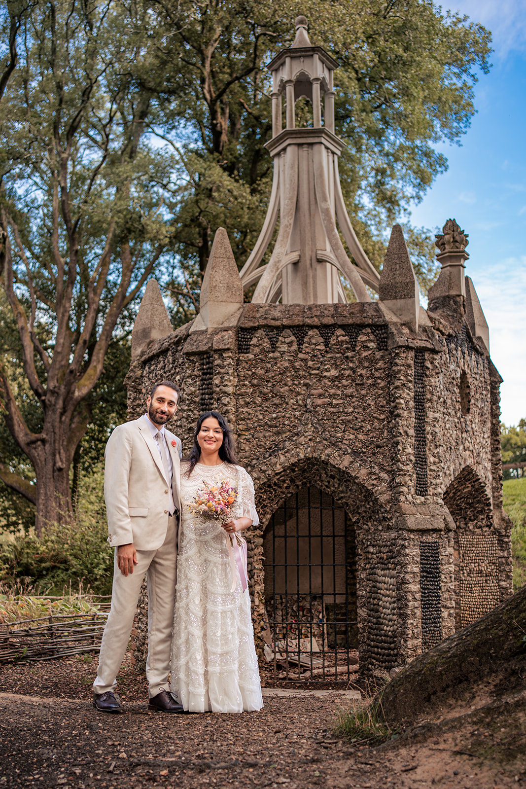 Couple in front of the gothic folly at Staunton Country Park, Havant