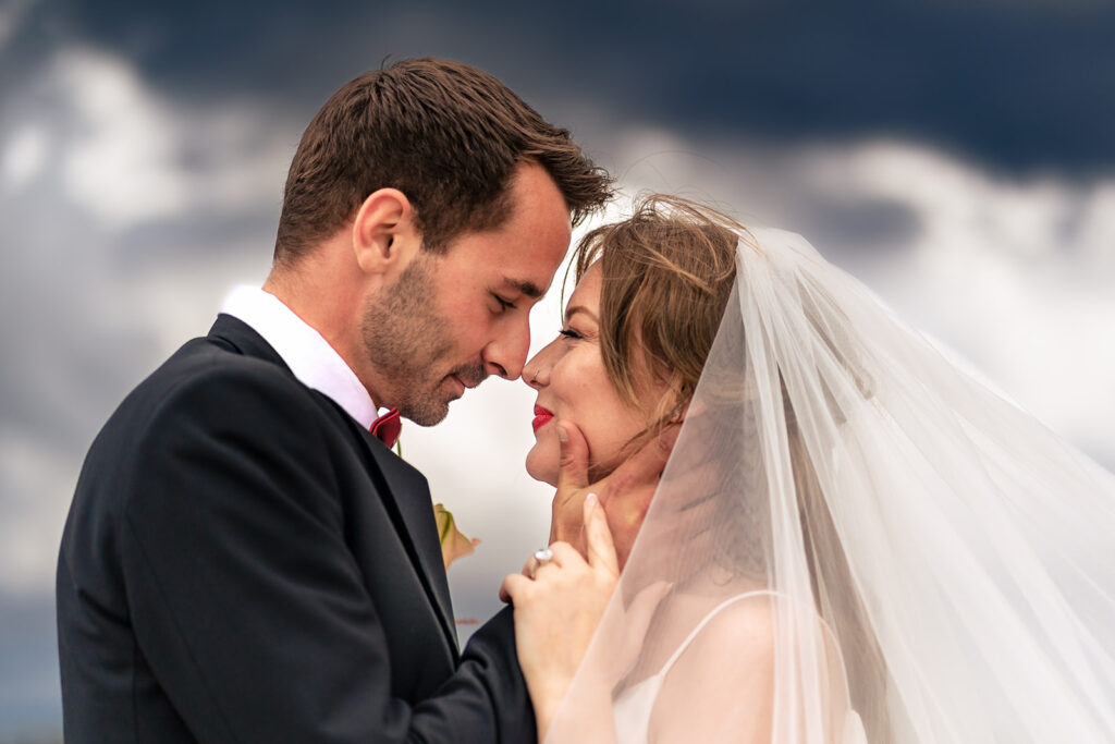 Couple laughing on the castle walls at Ashbys and Southsea Castle, styled shoot