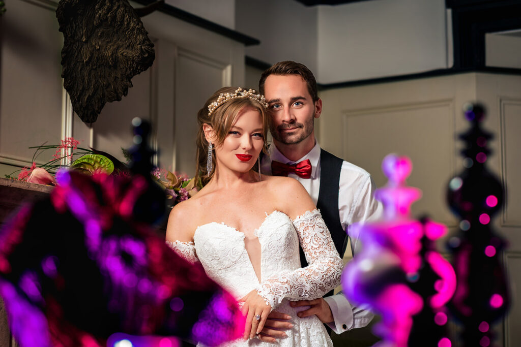 Couple with purple flash lighting at Ashbys and Southsea Castle, styled shoot