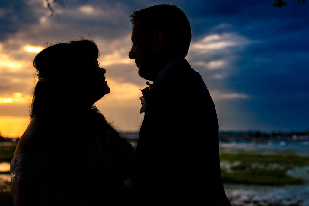 Sunset silhouette over Langstone Harbour at Langstone Quays Resort, Hayling Island