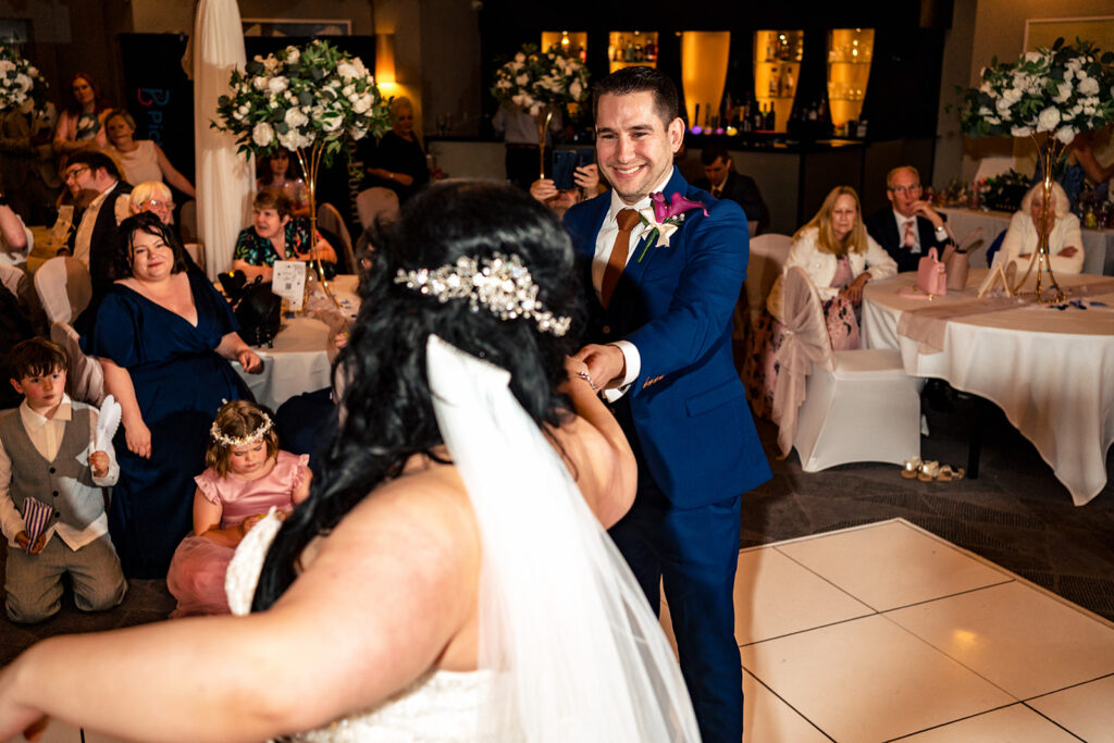 Bride laughing during the reception at Langstone Quays Resort, Hayling Island