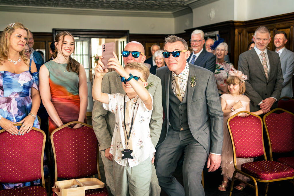 Guests cheering in the ceremony room at Lodge Hill Centre, West Sussex