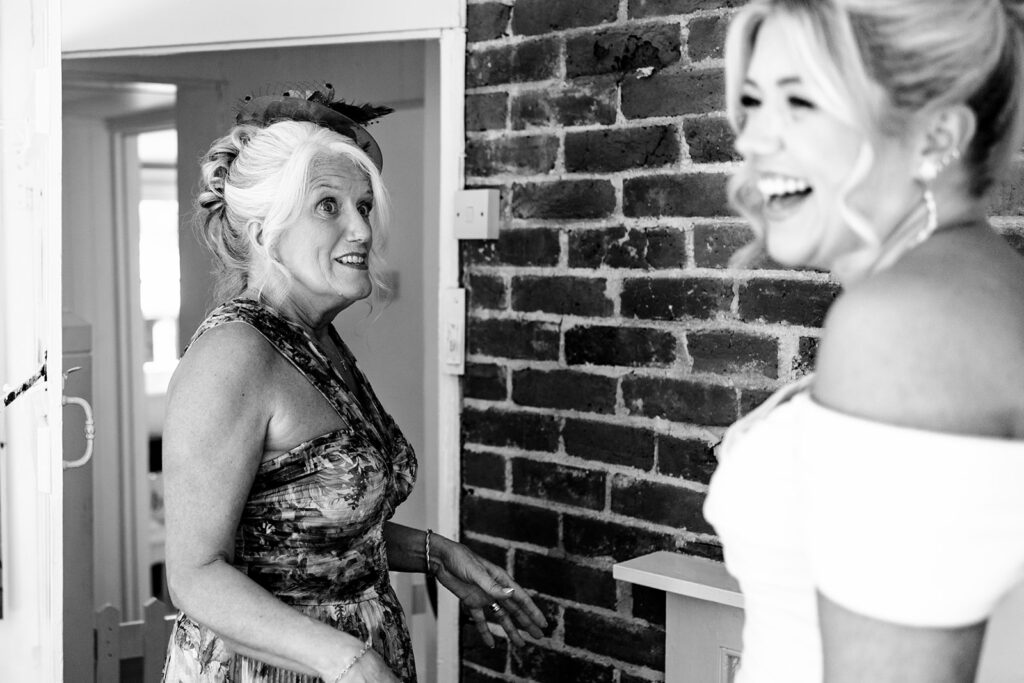 Bride sharing a moment with her mum before the ceremony at Tournerbury Woods Estate, Hayling Island