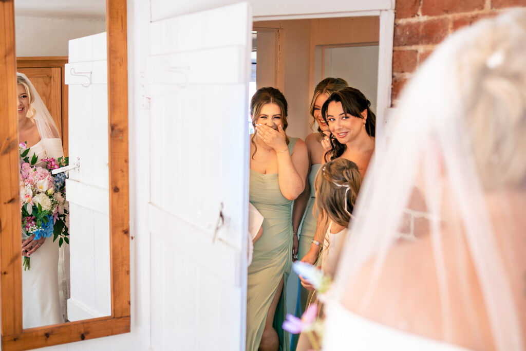 Bridesmaids in sage green getting ready at Tournerbury Woods Estate, Hayling Island