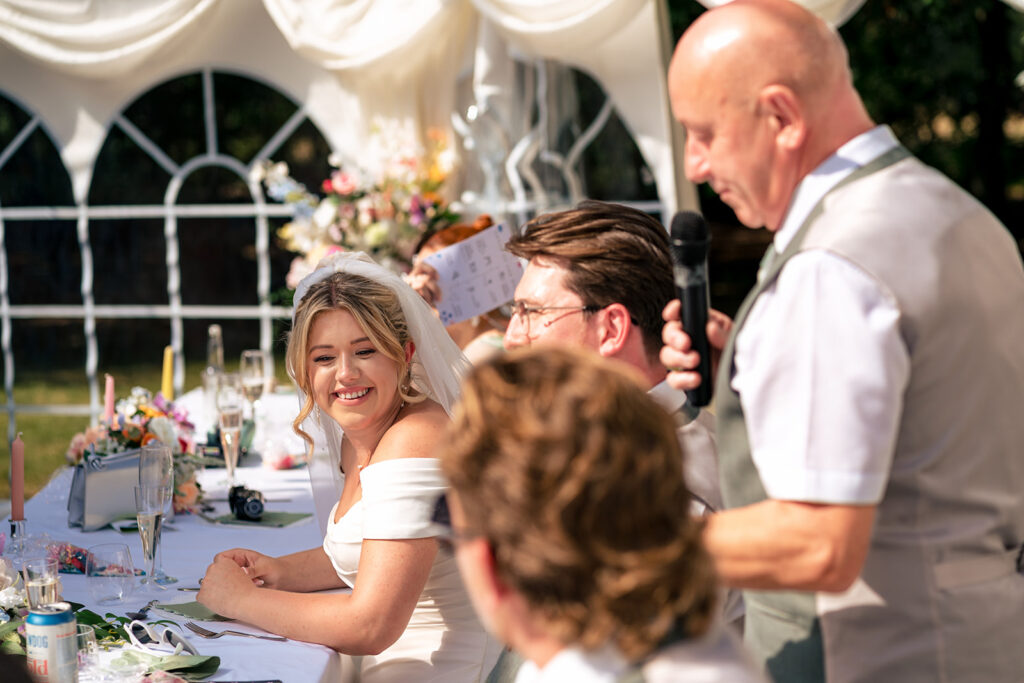 Speeches at the long tables in the marquee at Tournerbury Woods Estate, Hayling Island