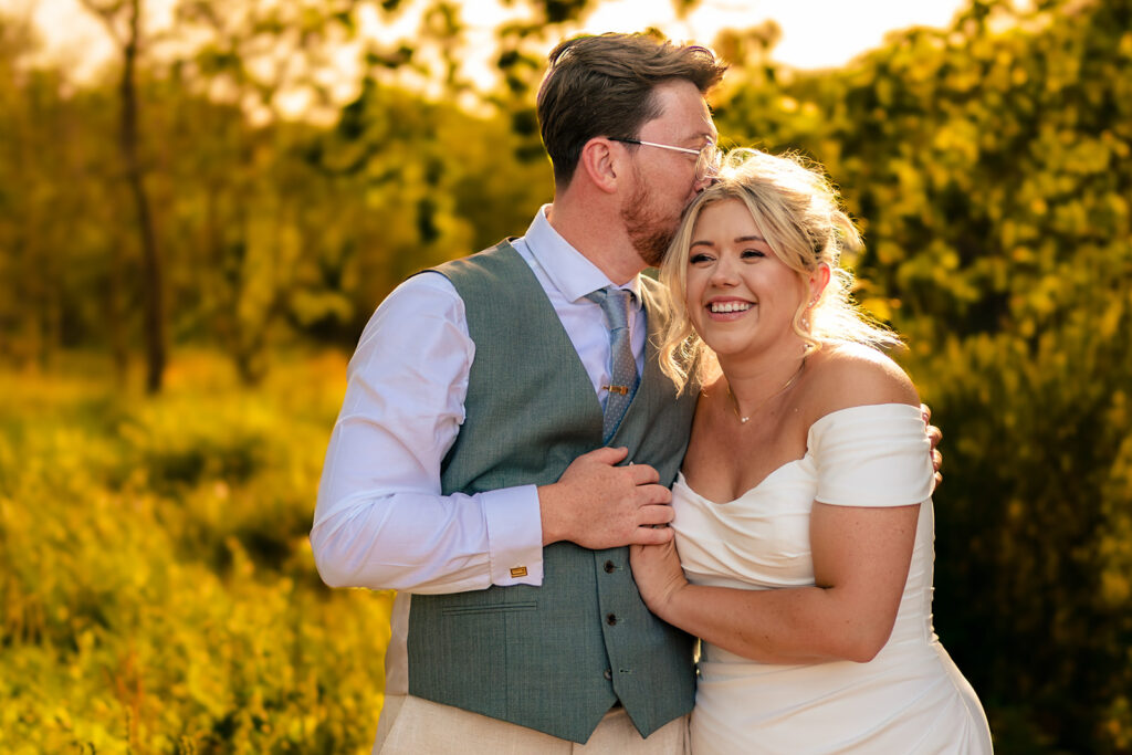 Golden hour portrait of the newlyweds at Tournerbury Woods Estate, Hayling Island