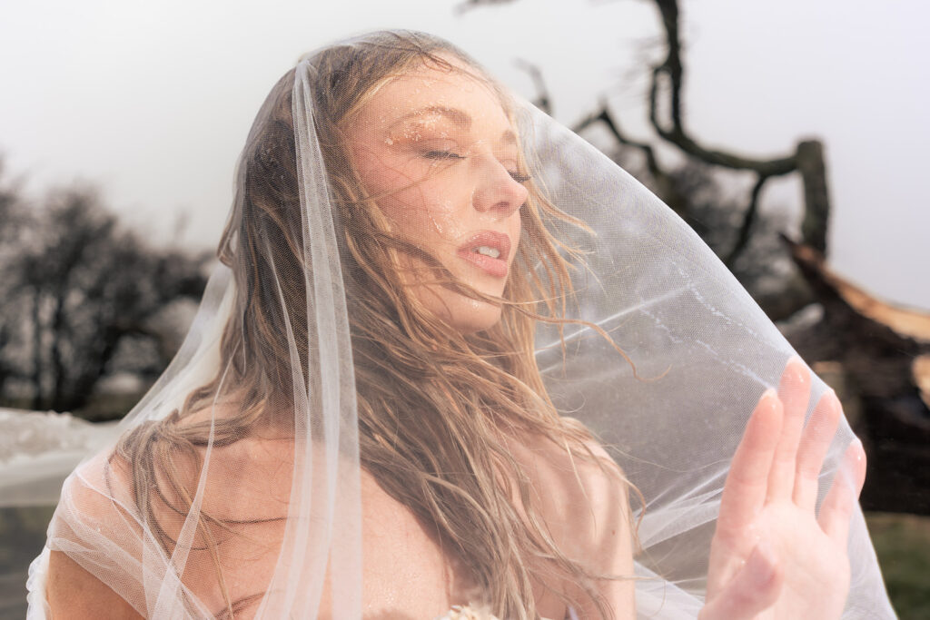 Windswept veil portrait at Butser Hill, Wuthering Heights styled shoot