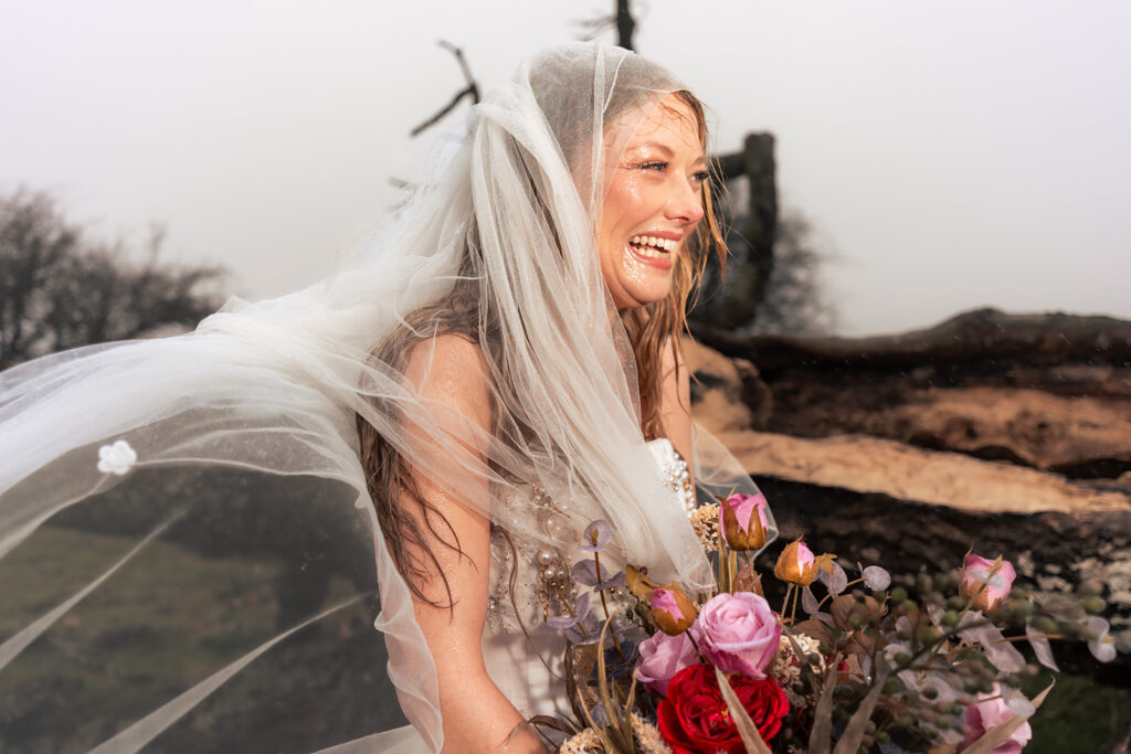 Veil flying in the wind at Butser Hill, Wuthering Heights styled shoot