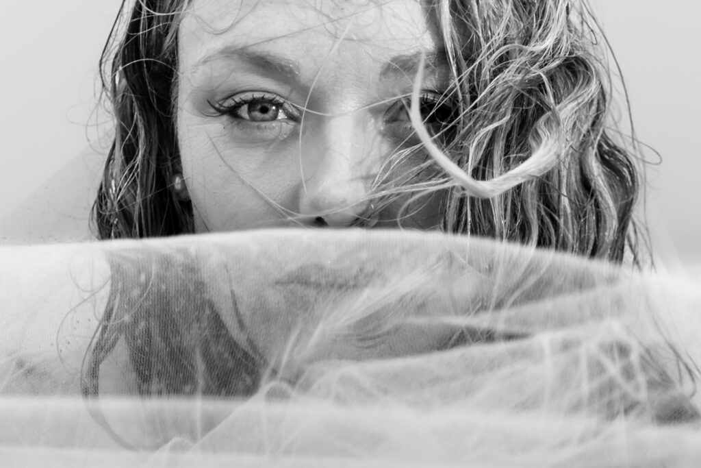 Veil over the eyes, black and white at Butser Hill, Wuthering Heights styled shoot